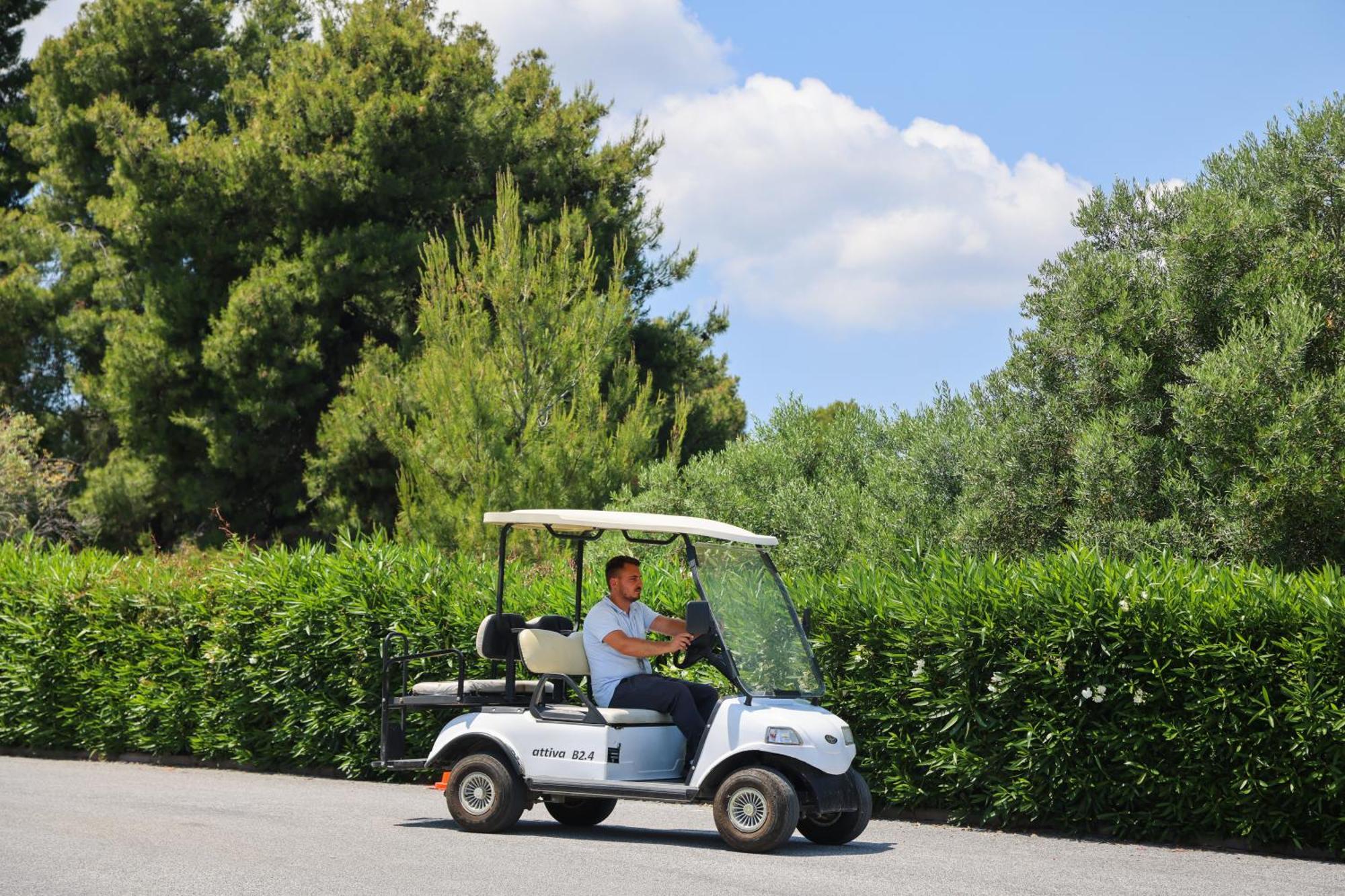 Alia Palace Hotel - Adults Only 16+ Chalkidike Exteriör bild Golf cart