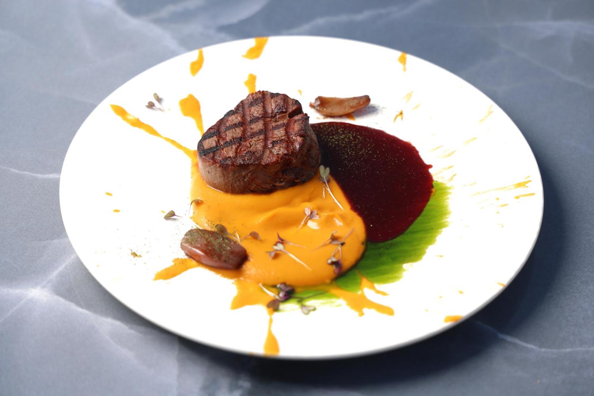 Alia Palace Hotel - Adults Only 16+ Chalkidike Exteriör bild A steak with a pumpkin sauce