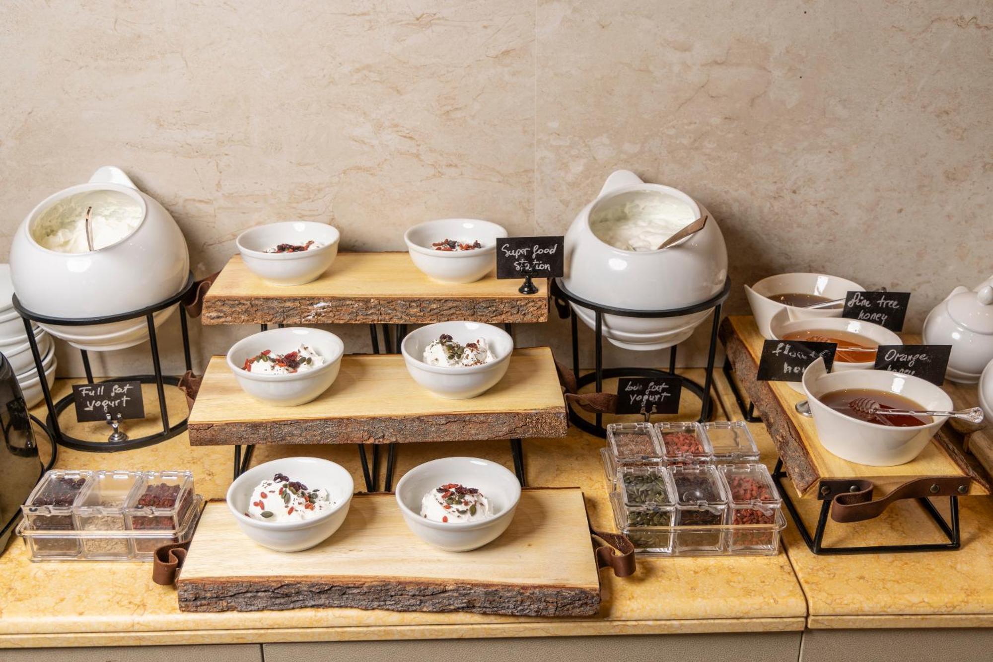 Alia Palace Hotel - Adults Only 16+ Chalkidike Exteriör bild A selection of teas at a buffet